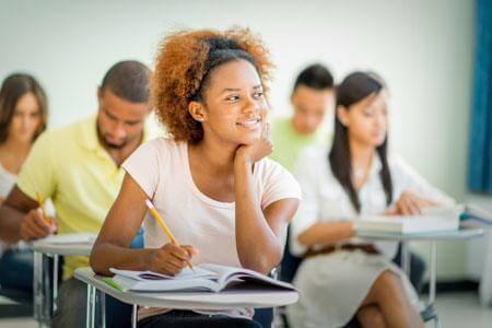 smiling student in classroom