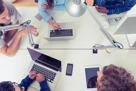 group of people meeting together and having a discussion