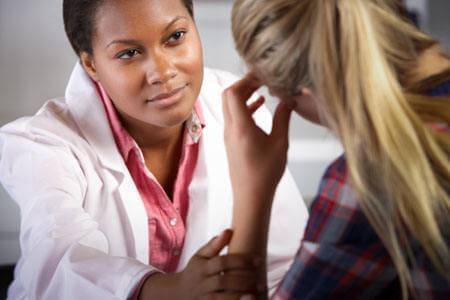 therapist meeting with patient
