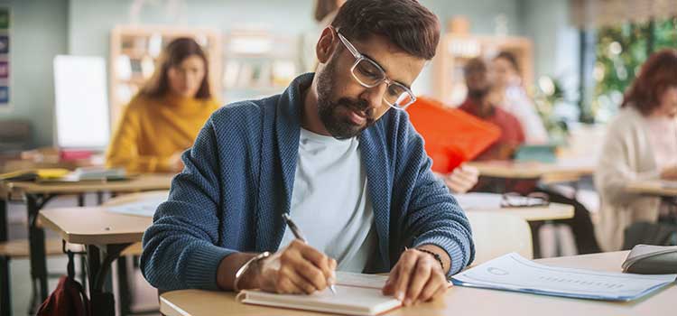 man studying for licensing exam