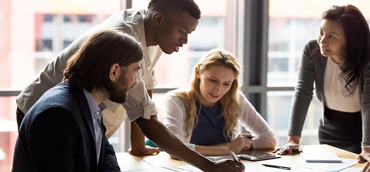 group of statisticians and psychometricians reviewing reserach