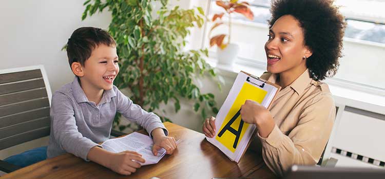 psychometrist tests child on reading comprehension